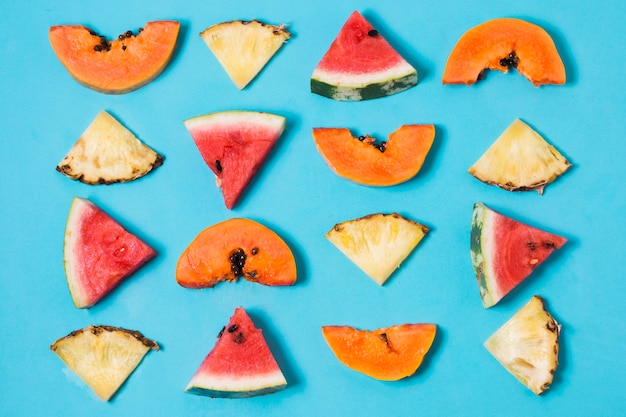 Free photo top view selection of watermelon and pineapple slices