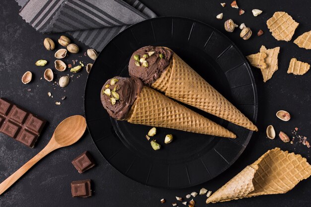 Top view set of ice cream cones with chocolate