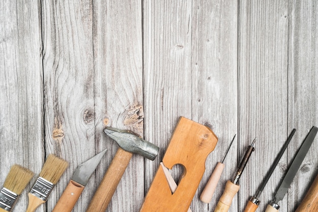 Top view set of tools on wooden table