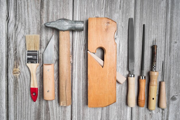 Top view set of tools on wooden table