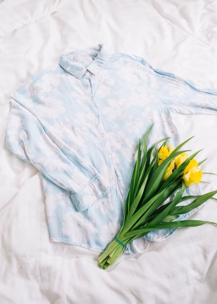 Top view of shirt in bed