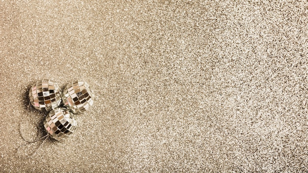 Top view silver christmas balls on granite surface