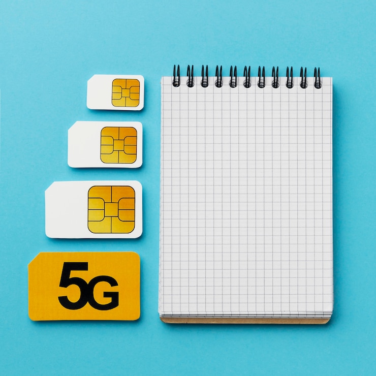 Free Photo top view of sim cards with notebook