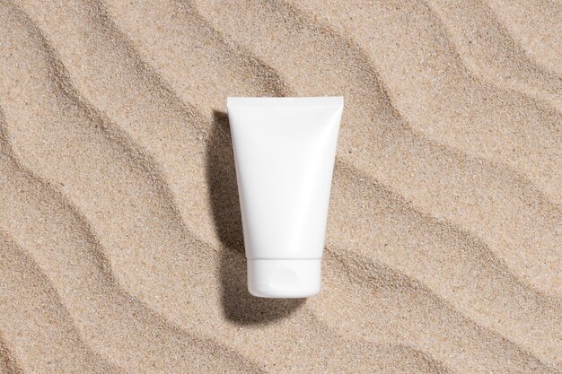Top view skincare product on the beach