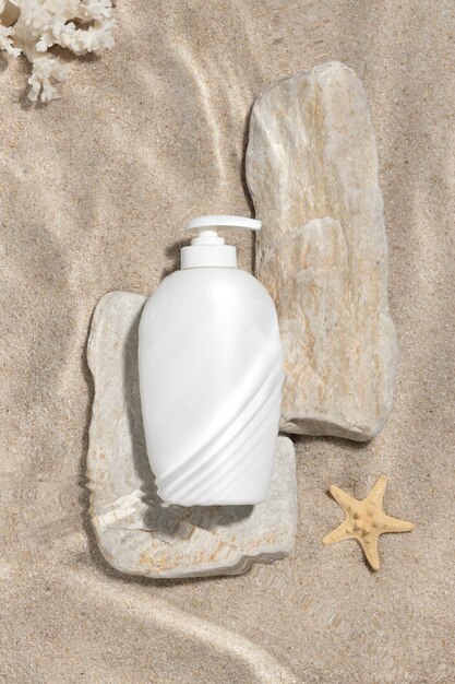 Top view skincare product on the beach