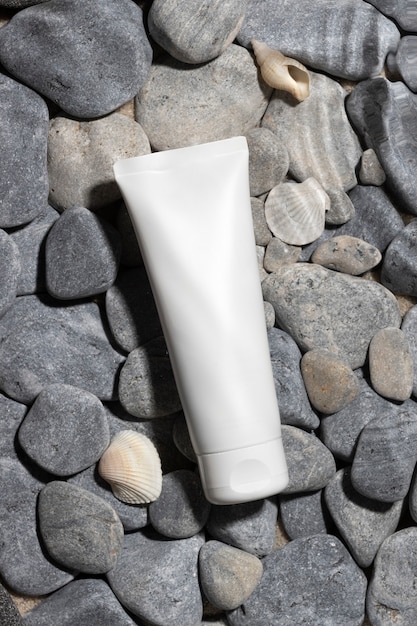 Top view skincare product on the beach