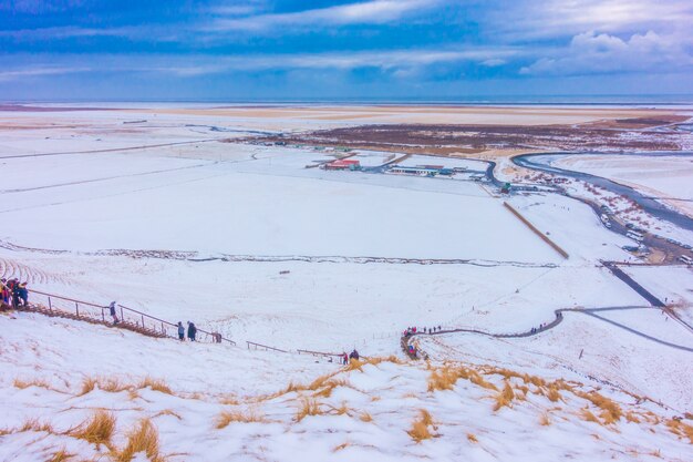 Top view  of Skogafoss waterfall at the south coast of Iceland .