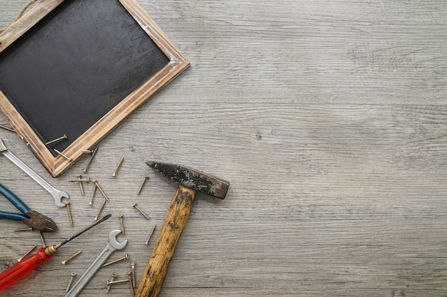 Free photo top view of slate and tools for father's day