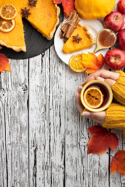 Top view sliced pumpkin pie copy space