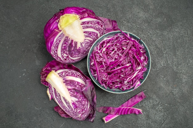 Top view of sliced red cabbage fresh vegetable on dark background