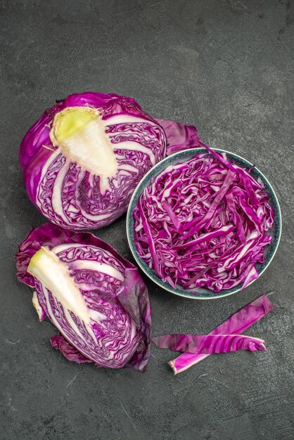 Top view of sliced red cabbage fresh vegetable on dark background