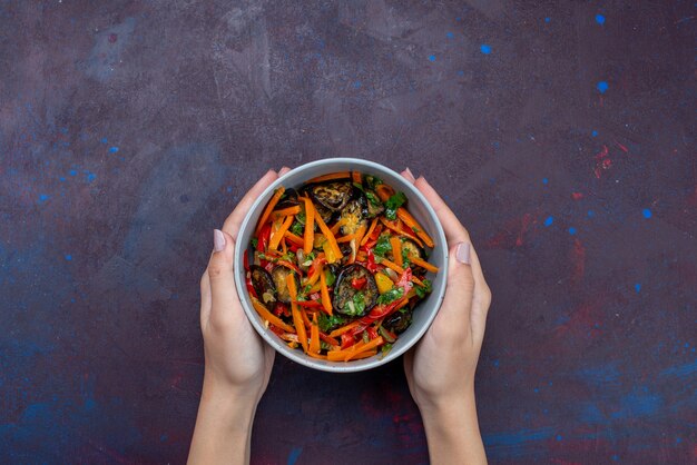 Top view sliced vegetable salad inside plate on the dark desk salad food snack vegetable