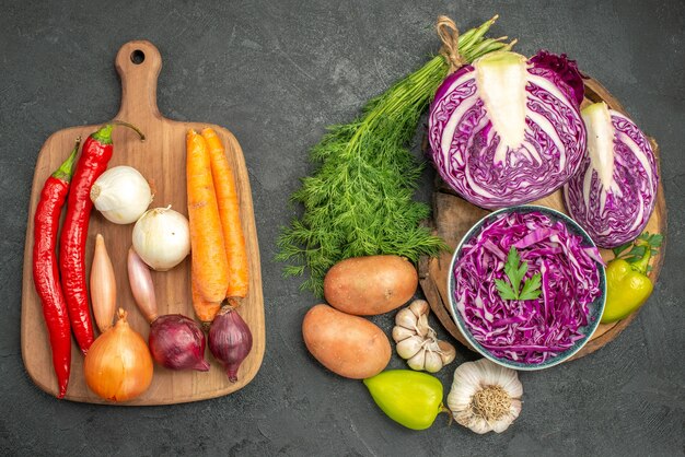 Top view of sliced vegetables with greens