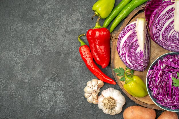 Top view of sliced vegetables with greens