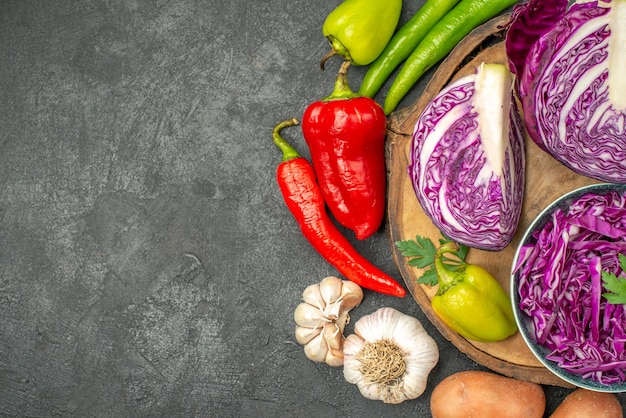 Top view of sliced vegetables with greens