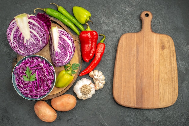 Top view of sliced vegetables with greens