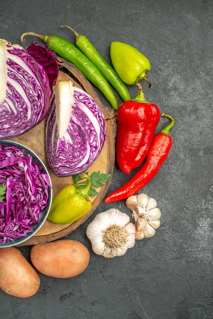 Top view of sliced vegetables with greens