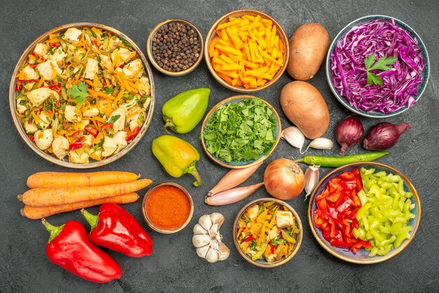 Top view of sliced vegetables with greens