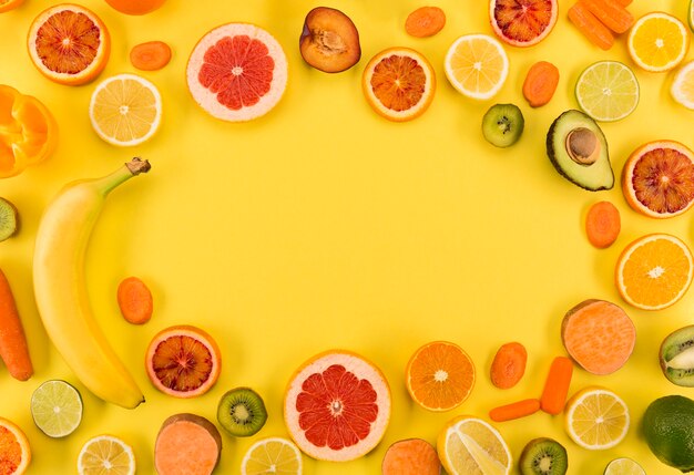 Top view slices of fruit and copy space