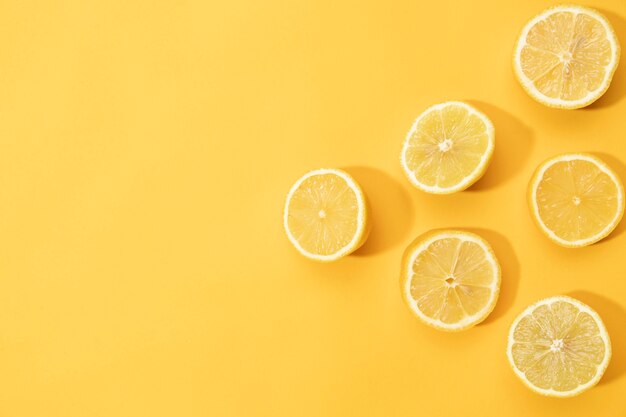 Top view slices of lemon with copy space