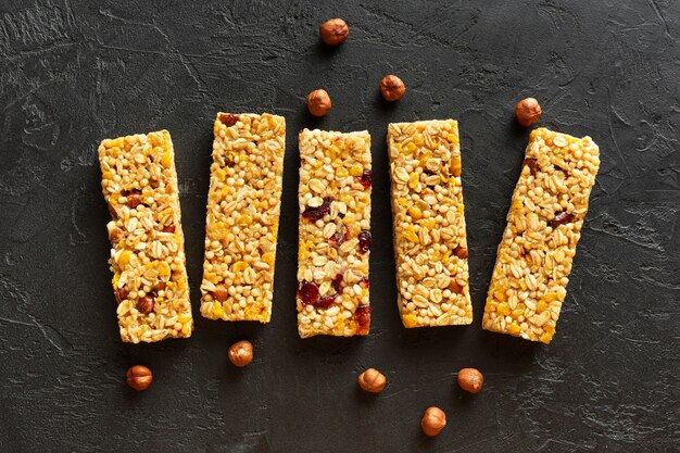 Top view snack bars with hazelnuts