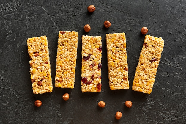 Top view snack bars with hazelnuts