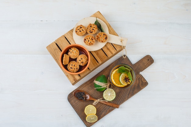 Top view of snacks with herbal tea