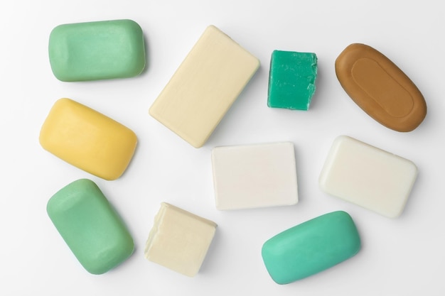 Top view of soap bars flat lay on white background