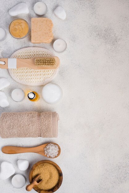 Top view spa accessories with towel and stones