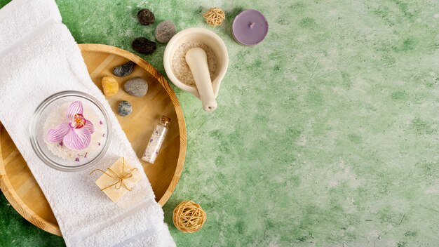 Top view spa arrangement on green background