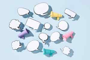 Free photo top view speech bubbles and megaphones