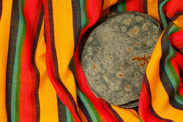 Top view spinach tortilla on fabric