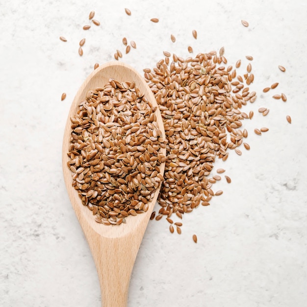 Top view spoon with seeds close-up