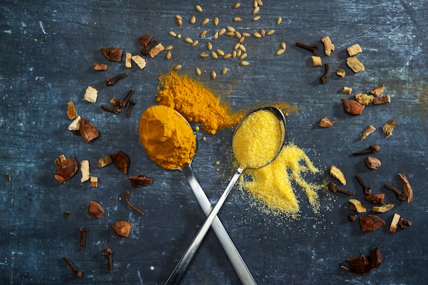 Top view spoons with spices arrangement