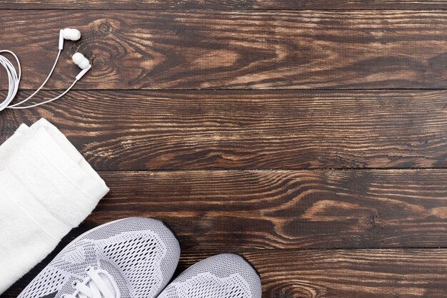 Top view sport shoes on wooden background