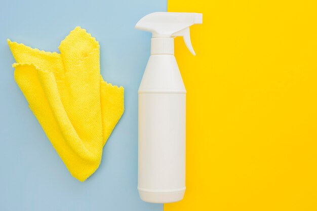 Top view spray bottle with cloth on the table