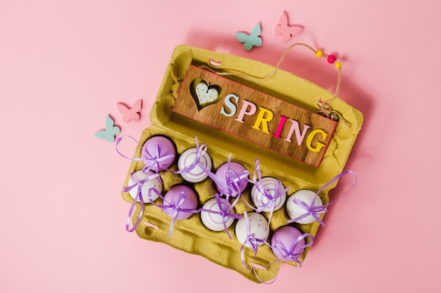 Top view of spring background with easter eggs