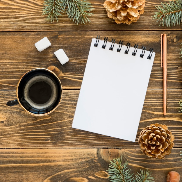 Free photo top view stationery empty papers and cup of coffee