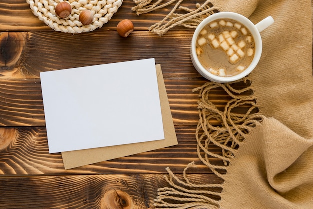 Top view stationery empty papers and warm beverage