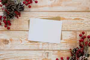 Free photo top view stationery empty papers with christmas flowers