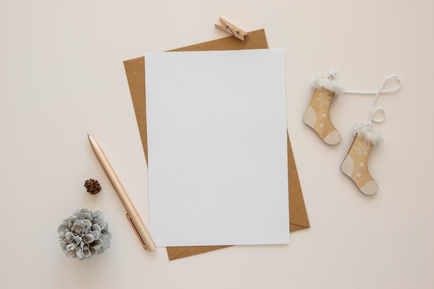 Top view stationery empty papers with winter decor