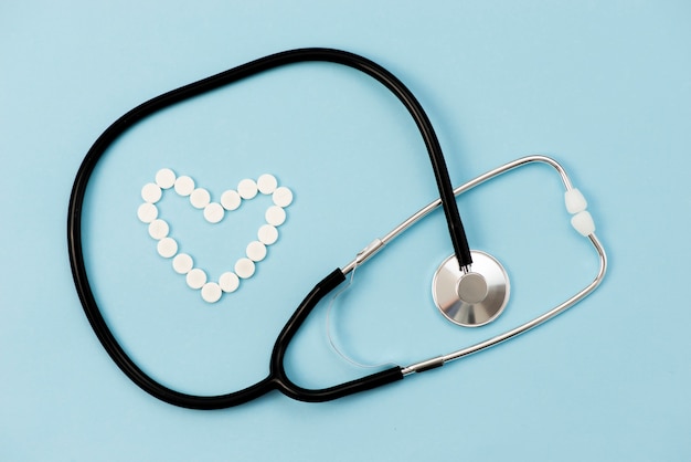 Top view stethoscope on blue background