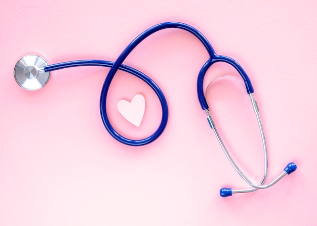 Top view of stethoscope with paper heart