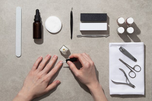 Top view still life composition of nail care products