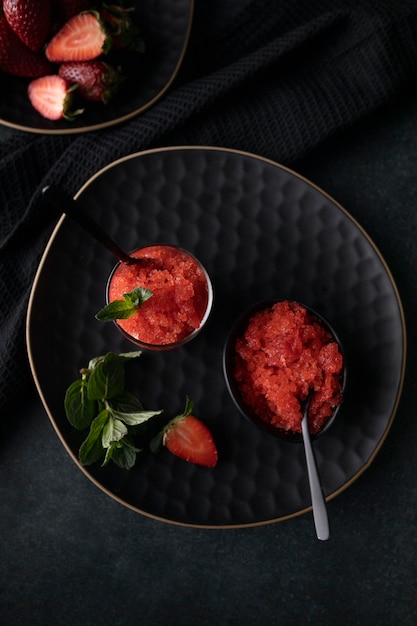 Top view strawberry granita dessert with mint