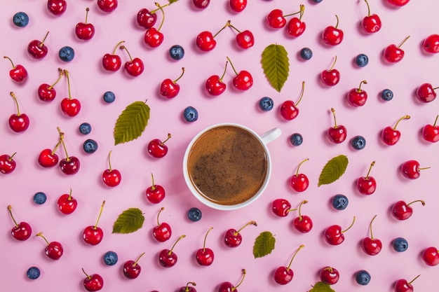 Top view of summer composition with drink and fruits