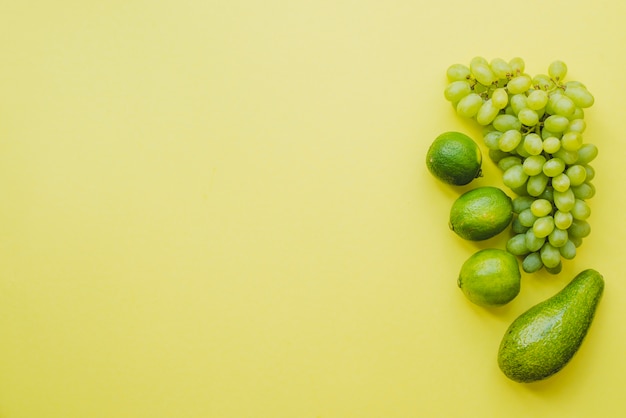 Top view of summer composition with green fruits