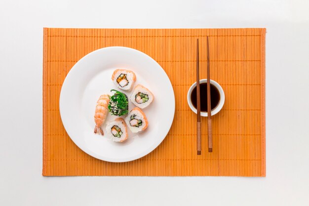 Top view sushi day concept with soy sauce