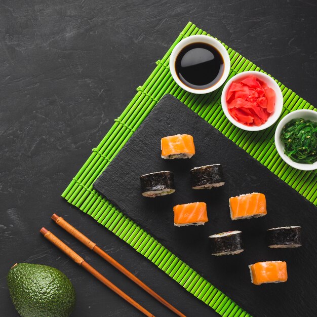 Top view sushi plating on bamboo mat