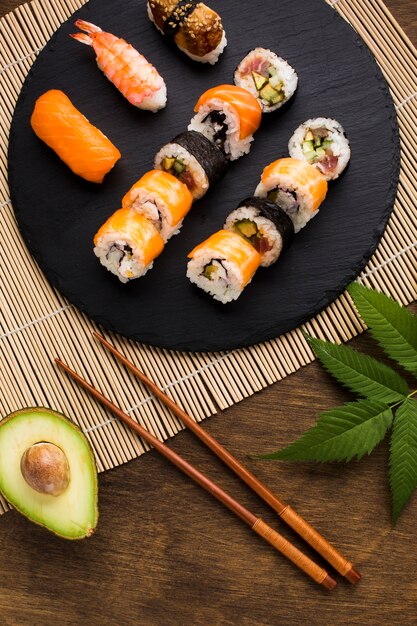 Top view sushi plating on wooden background